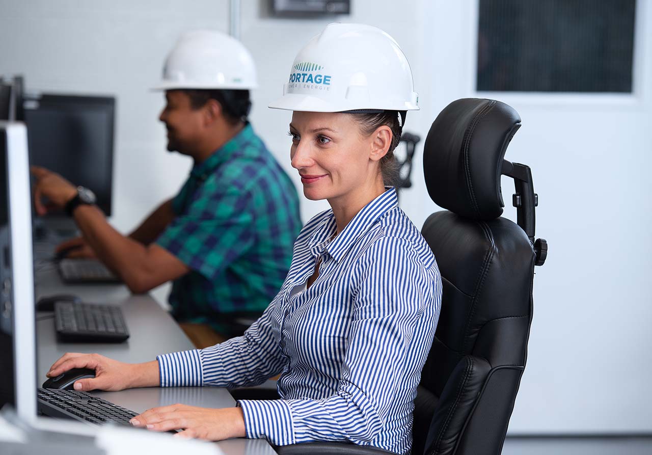 Image 2 Female Portage Power employee in an office space